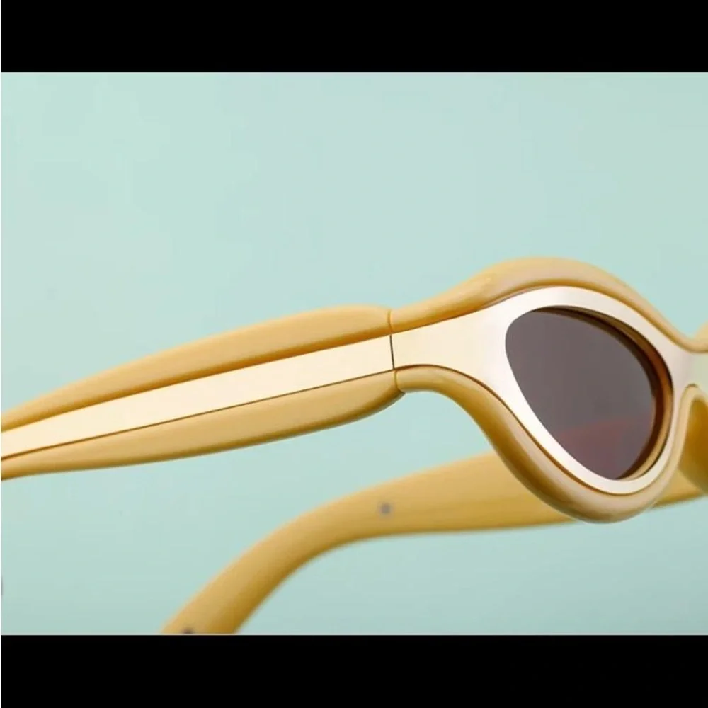 Luxury futuristic cat eye oval mustard pastel yellow steampunk sunglasses